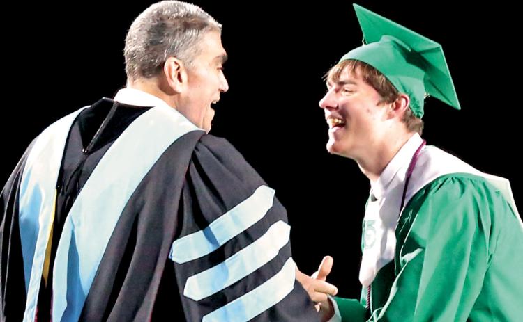 In one of his last duties as superintendent of Franklin County Schools, Chris Forrer presented son Christopher his high school diploma as a member of the FCHS Class of 2022.