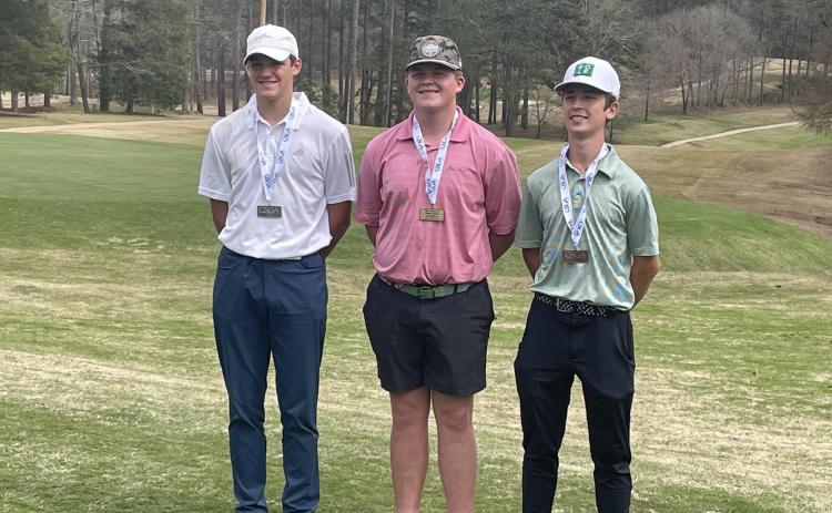 Franklin County High School senior D.J. Seymour (center) won a Georgia State Golf Association Junior Tour event Sunday at The Creek at Hard Labor golf course in Social Circle.