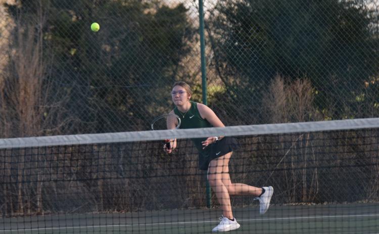 No. 1 singles player Olivia Phillips returns a ball in action Thursday against Stephens County.